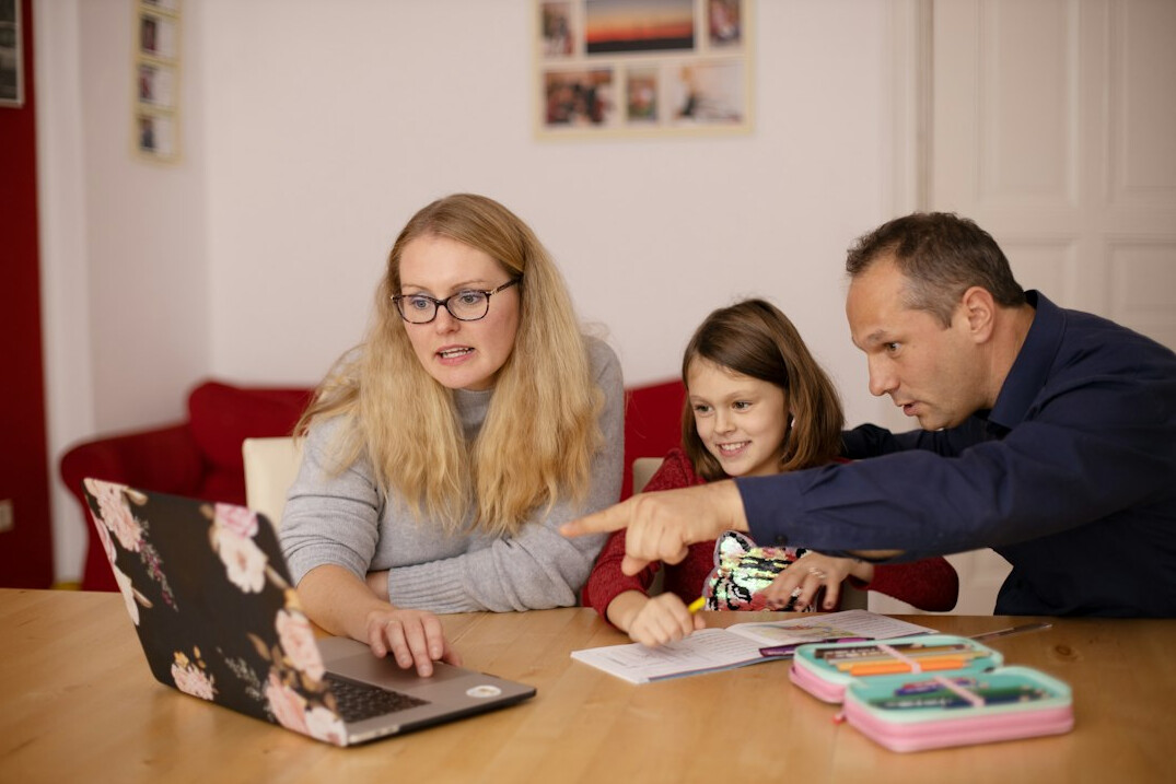 family discussing finances at home