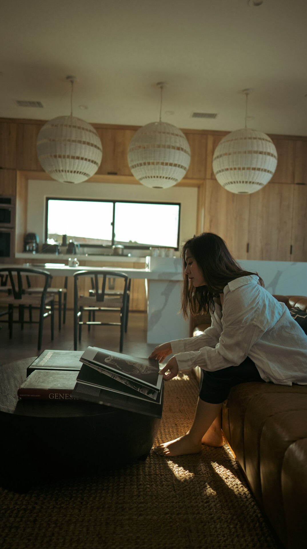 woman reviewing finances at home