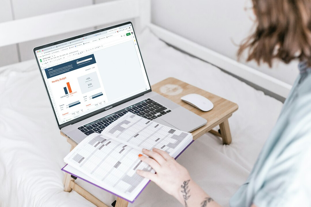 person reviewing budget spreadsheet